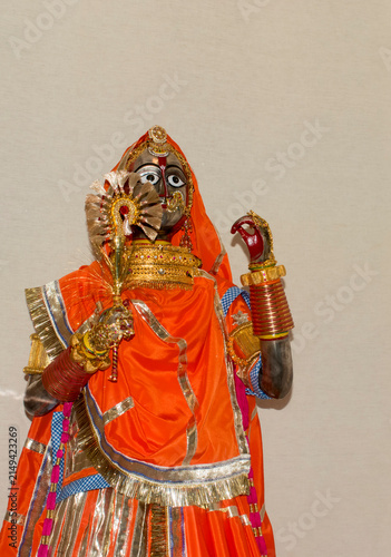 Bild auf Leinwand Gangaur Mata idol in traditional Rajasthani style, featuring vibrant clothing, d