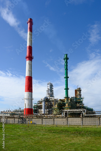 Obraz na plátně Colorful tall pipes, gas pipelines, tanks, ladders and other equipment for oil r