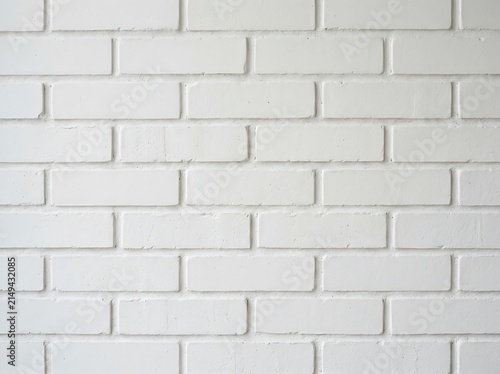 Close up of white brick wall texture with smooth surface with surface consistent