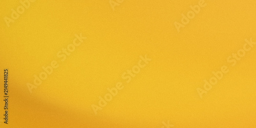 Obraz na płótnie Vibrant yellow background with soft gradient, minimalist solid gold color textur