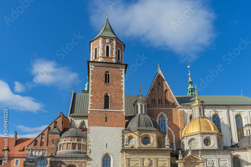 Wawel Cathedral facade with the golden dome of Sigismund Chapel and Zygmuntowska tower in Krakow, Poland.