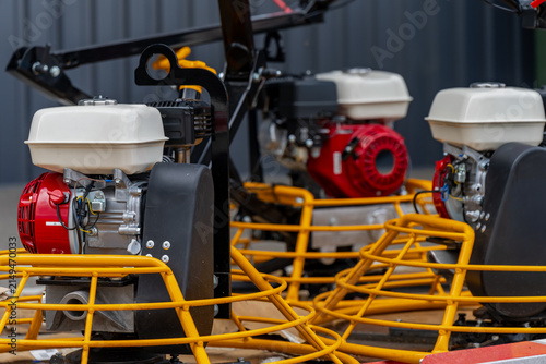 Obraz na plátně Heavy duty power trowel machines with internal combustion four stroke engines fo