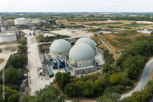 Sugar Refinery Plant With Large Storage Domes Viewed From Above During a Summer Day