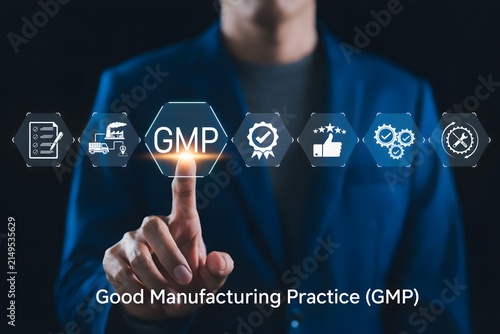 Good Manufacturing Practice (GMP) Concept. Businessman touching GMP with icons representing quality control, manufacturing assurance, standards, certification, certified, and regulatory compliance.