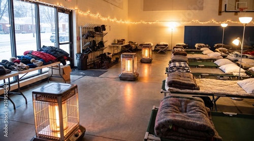 temporary warming shelter inside a civic center during winter