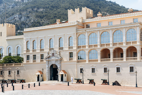 Bild auf Leinwand Monaco, Monaco - July 17, 2026: A Prince's Carabinier stands outside the main en