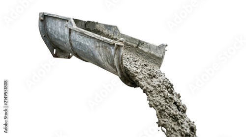 Fotografía Concrete flowing from industrial chute isolated on black background