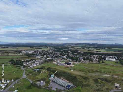 Dornoch, northern Scotland, sits in Sutherland beside Dornoch Firth; its 1224 cathedral and 1509 castle define this historic Highland town.