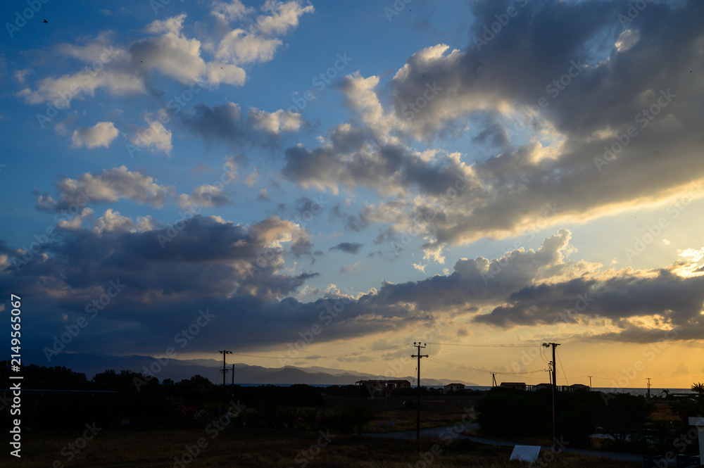 Obraz premium Dramatic Sunset Over Cyprus Mountains and Mediterranean Sea
