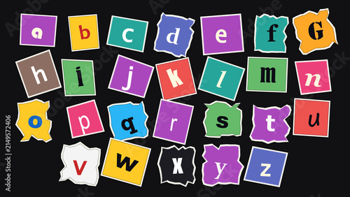 Scattered Alphabet Blocks: A vibrant collection of colorful, torn alphabet blocks scattered against a dark background, representing letters from A to Z.