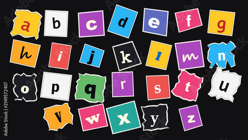Alphabet Soup: A vibrant collection of lowercase letters scattered across a dark background, each on a colorful, torn paper square, inviting creativity and learning.