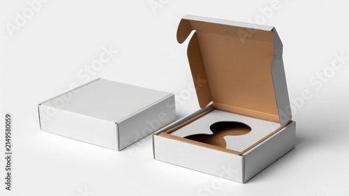 Set of blank white cardboard shipping boxes with custom circular die-cut insert