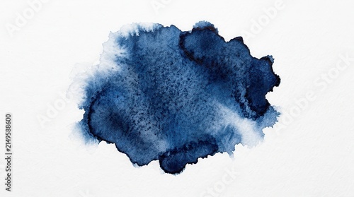 Dark blue watercolor stain on a white background.