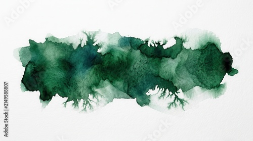 Dark saturated green watercolor blot abstraction on white background.