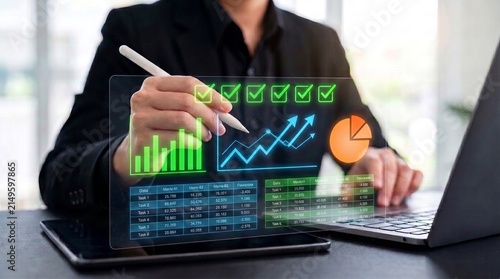 Konstfotografi business performance management concept showing professional analyzing digital progress data on laptop with target checklist, productivity chart, financial graph, and task completion metrics