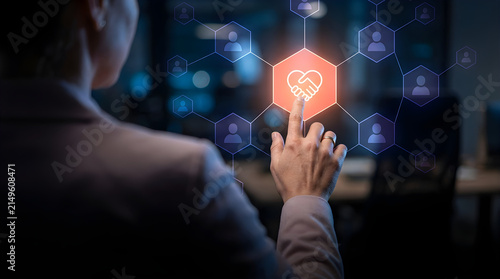 Businesswoman touching digital care hologram icon surrounded by people network representing customer relationship and human connection concept