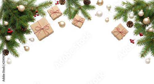 Christmas border with craft gift boxes and fir branches on white background.
