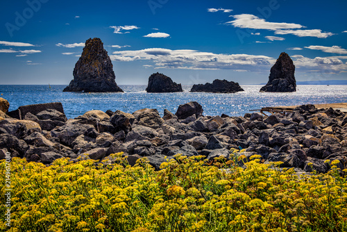 Fotografie Faraglioni Rock Formations off Aci Trezza on Sicily's Ionian Coast