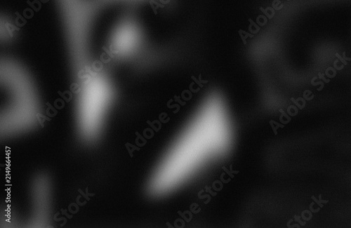 Foto Blurry abstract light shapes on dark background