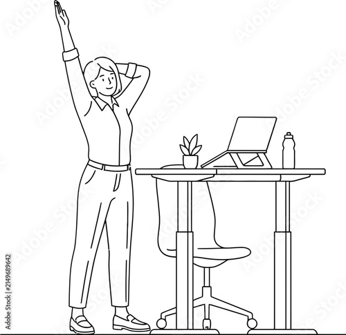 Young woman stretching at her standing desk during office break.