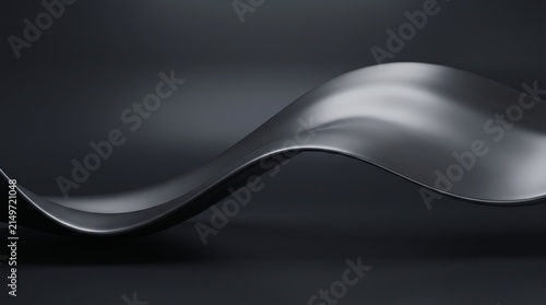 A fluid, metallic wave-like sculpture on a dark, moody background.