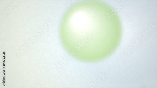A soft, glowing light green sphere isolated on white background