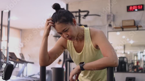 Hyrox race sled push heavy effort HIIT sport active asia people young Gen Z woman self care tired sweat take a break rest. High VO2 max cross power body muscle weight loss anti aging indoor gym living