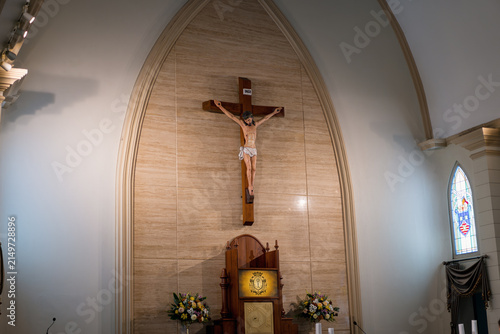 Fotografie Interior view of a church featuring a crucifix and altar