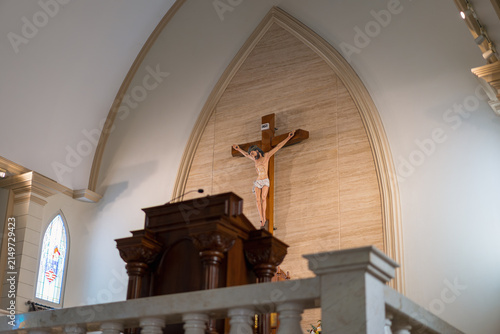 Canvastavla Interior view of a church featuring a crucifix on the altar