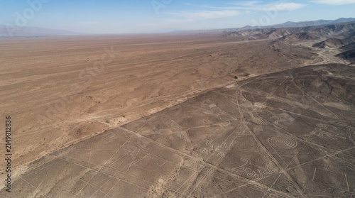 Vast Arid Desert Landscape with Geometric Patterns from Above.