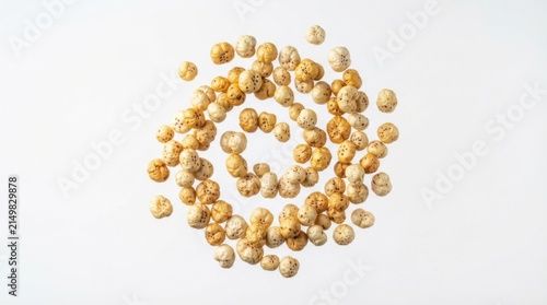 Bowl of roasted makhana seeds on white background