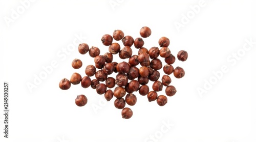 Sorghum grains suspended in mid-air against plain background