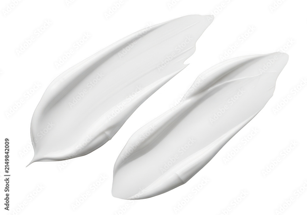 Obraz premium Two white cosmetic cream smears isolated on a transparent background