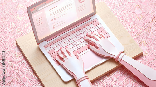 Pink paper craft laptop computer on wooden desk with stylized hands typing representing modern communication and remote work lifestyle.