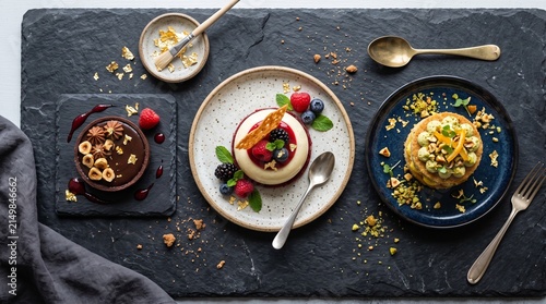 Elegant Assortment of Gourmet Desserts Featuring Chocolate, Fruit, and Nuts, Artfully Presented