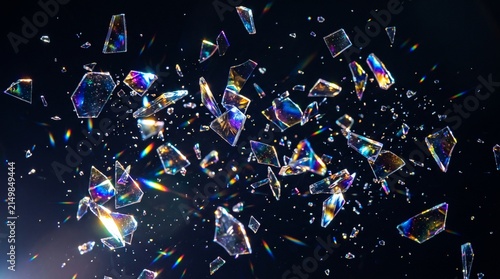 Shards of iridescent glass explode outwards, scattering rainbow refractions against a dark background
