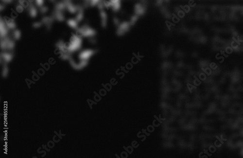 Foto Blurry abstract light shapes on dark background
