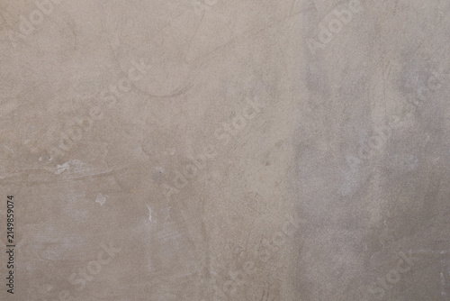 neutral grey beige concrete wall texture with subtle plaster marks, industrial rustic cement background concept for design and copy space.