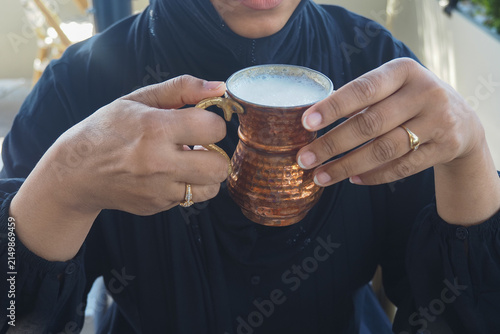 traditional hand-forged copper cup, commonly used in Turkish culture for serving chilled beverages like ayran.