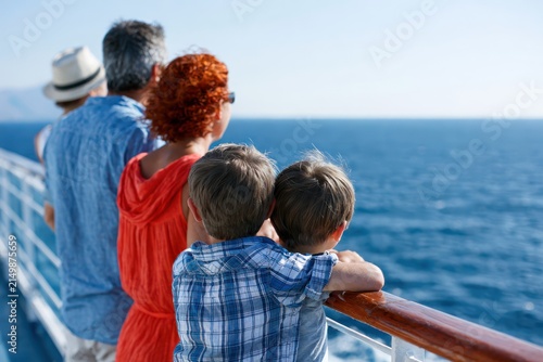 Children and parents on cruise ship deck