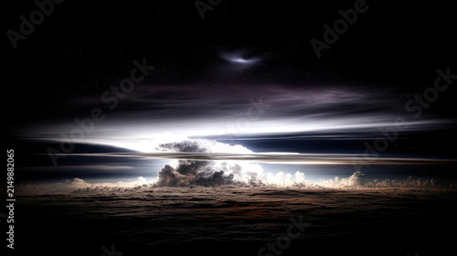 Dramatic Cloud Formation Illuminated by Lightning Strike.