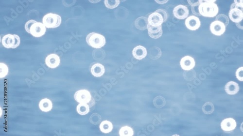 Abstract defocused water waves with blinking round flares in slow motion