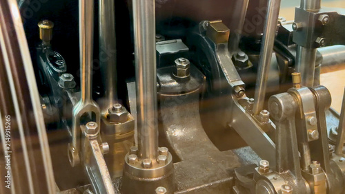 Canvas Print Close-Up of Polished Metal Pistons and Rods on Vintage Steam Engine