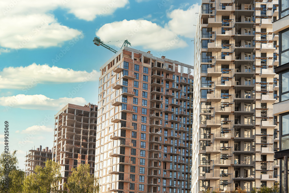 Fototapeta premium Modern Residential Development with High Rise Buildings Under Construction