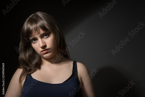 Beautiful Teenage Girl Portrait on Dark Background Beauty Concept
