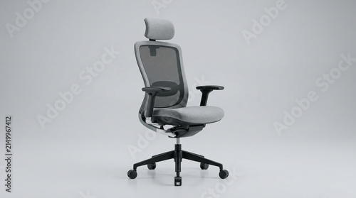 Gray office chair with mesh back and adjustable headrest, showcasing modern ergonomic design for comfort and support, ideal for office or home.