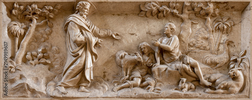 Busto Arsizio - The marble relief of Creation of Adam and Eva in the Paradise in church Chiesa di San Michaele by unknown artist.