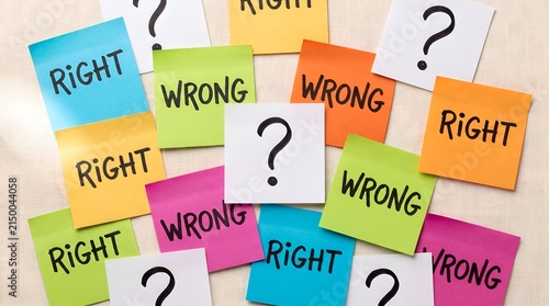 Decision making dilemma concept featuring colorful sticky notes with right and wrong text surrounding a central question mark for business ethics