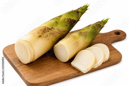 Fresh Bamboo Shoots with Sliced Pieces on White Background
