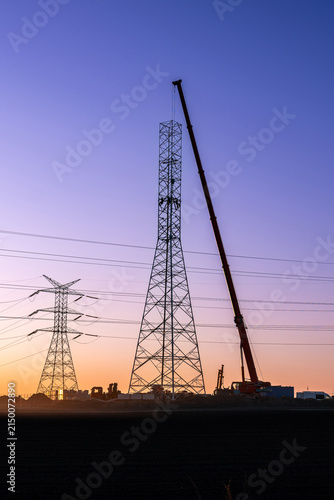 Power Transmission Network Construction at Sunset